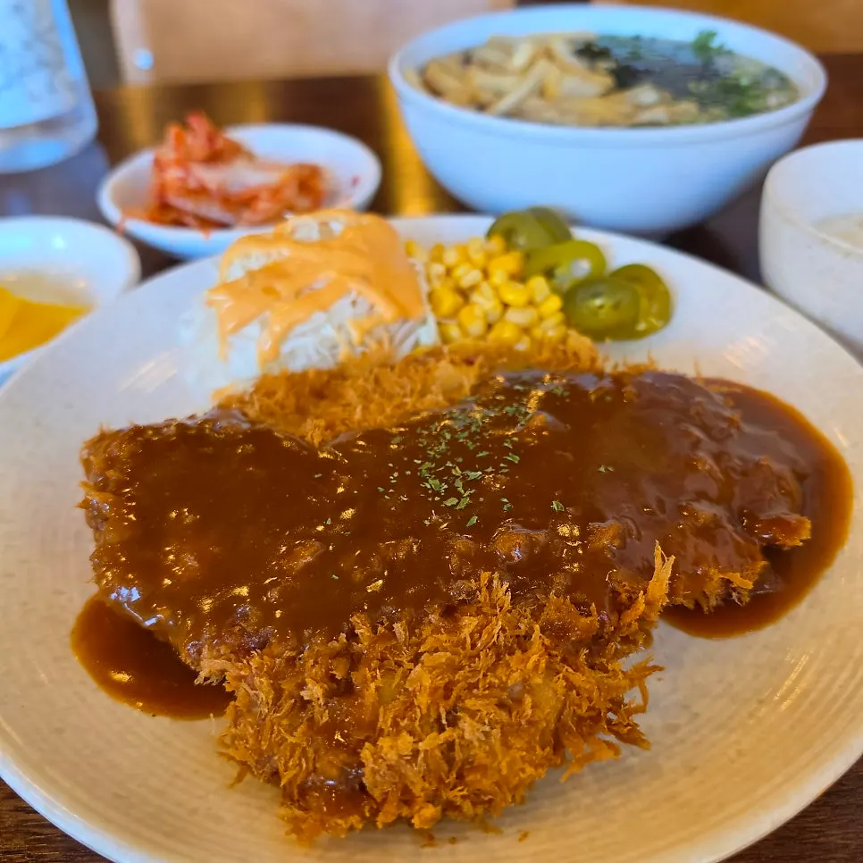 Plate of old-style pork cutlet served with rice