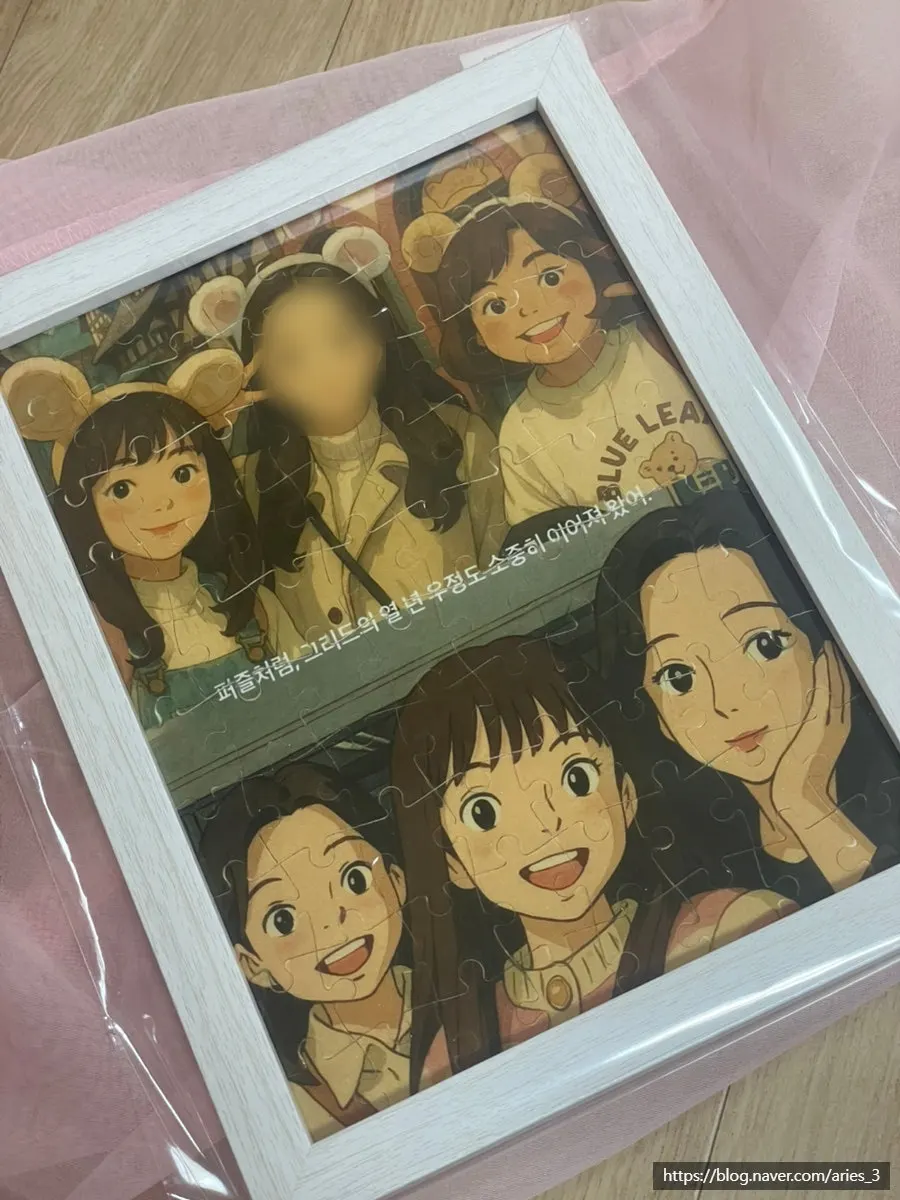 額とともにもらった完成フォトパズル