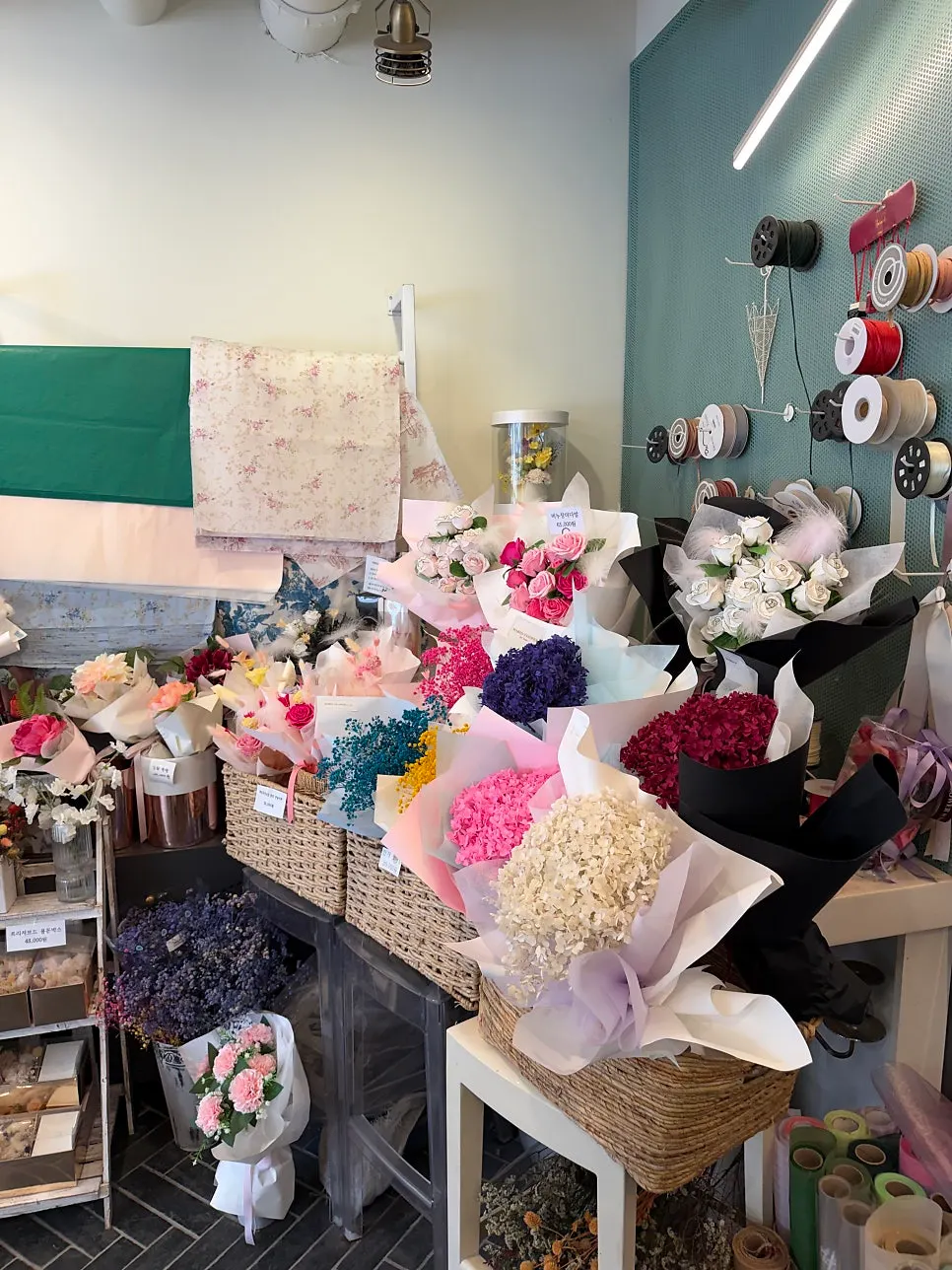 Potted plants and decor displayed inside the shop