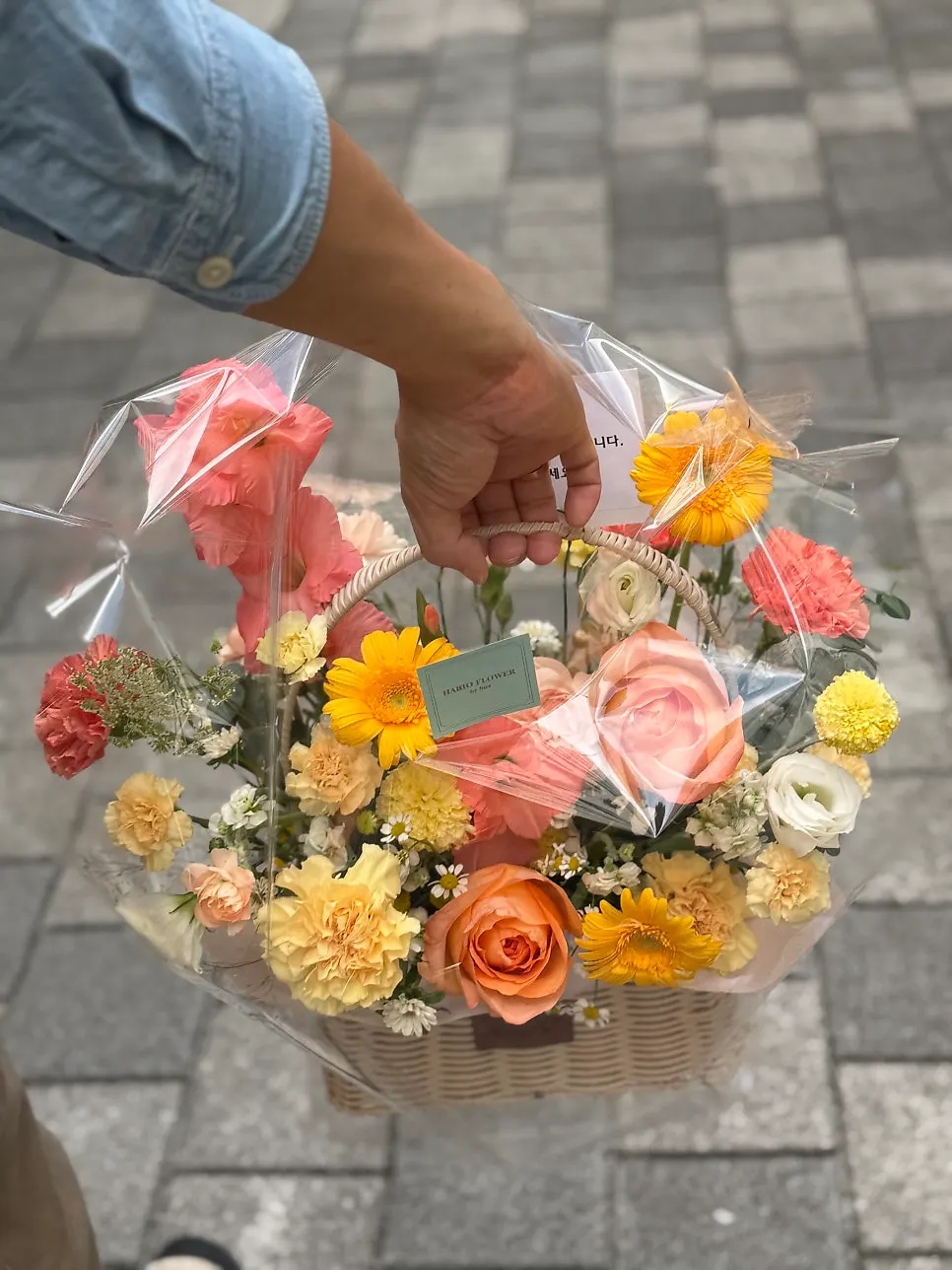 Flower basket wrapped and ready for pickup