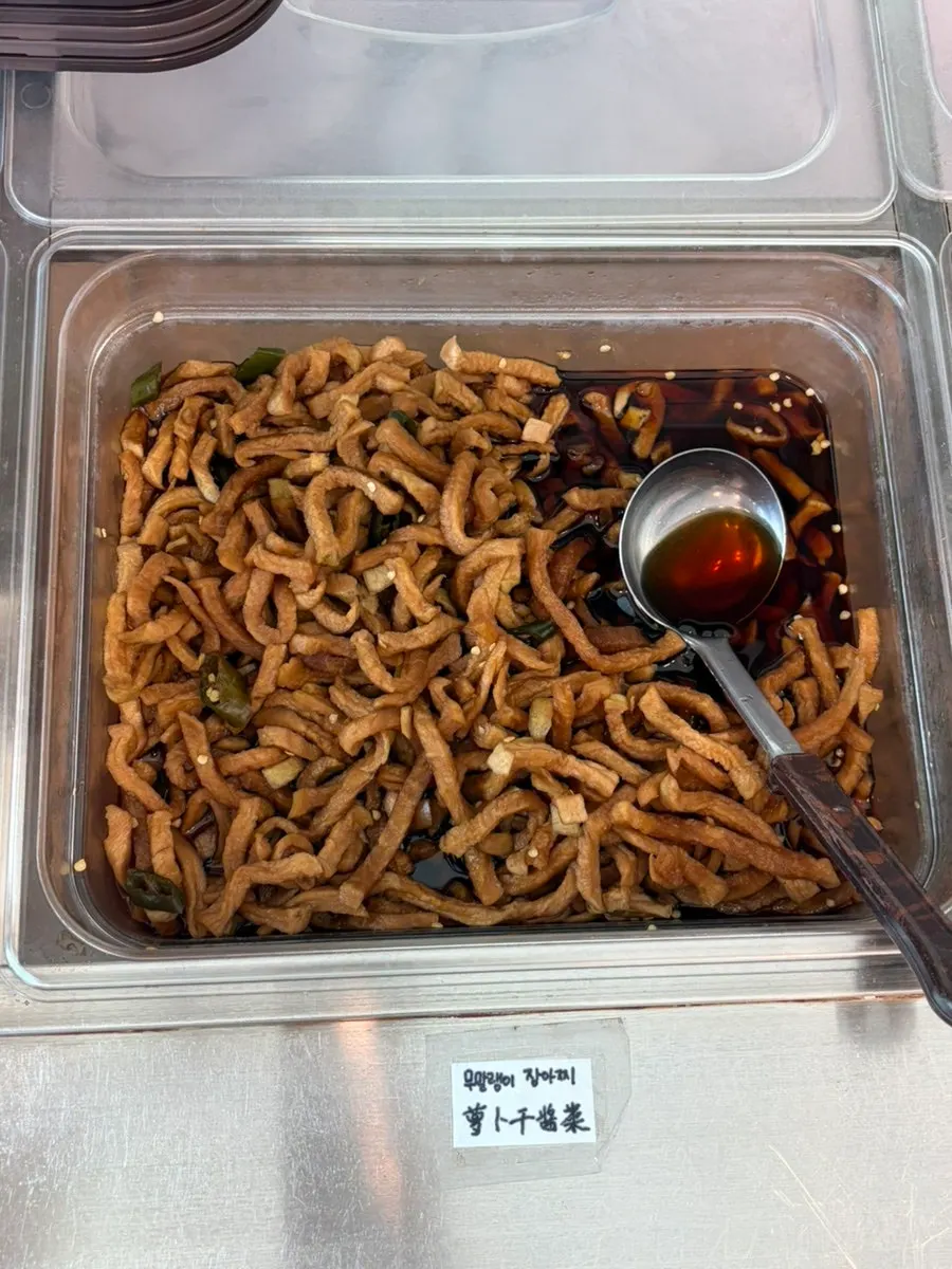 The self-serve side dish corner at Handam Guksu