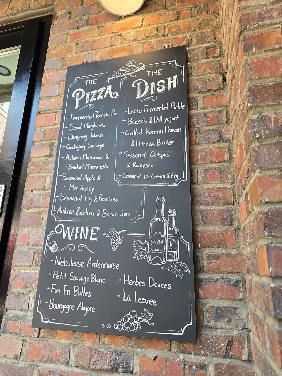TPM hbc menu board mounted on the exterior wall