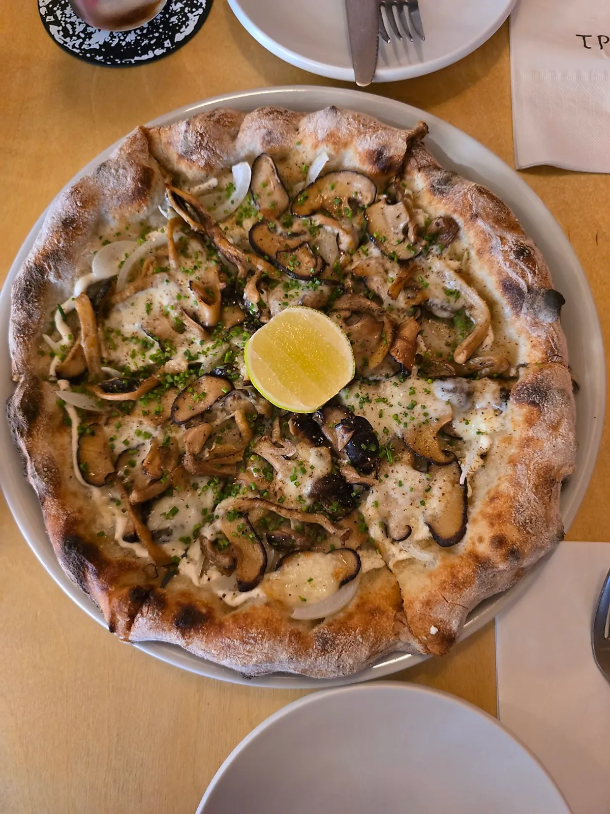 Whole fall mushroom and smoked mozzarella wood-fired pizza