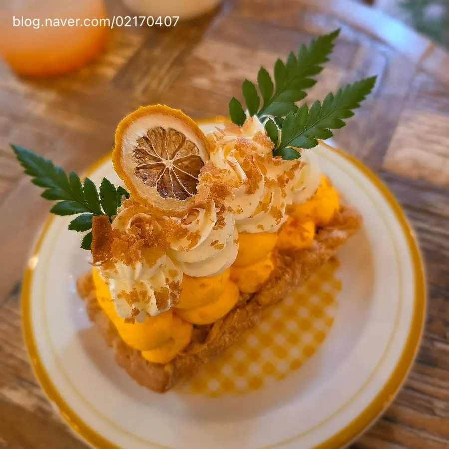 Lemon cake cream pie and drinks on the table