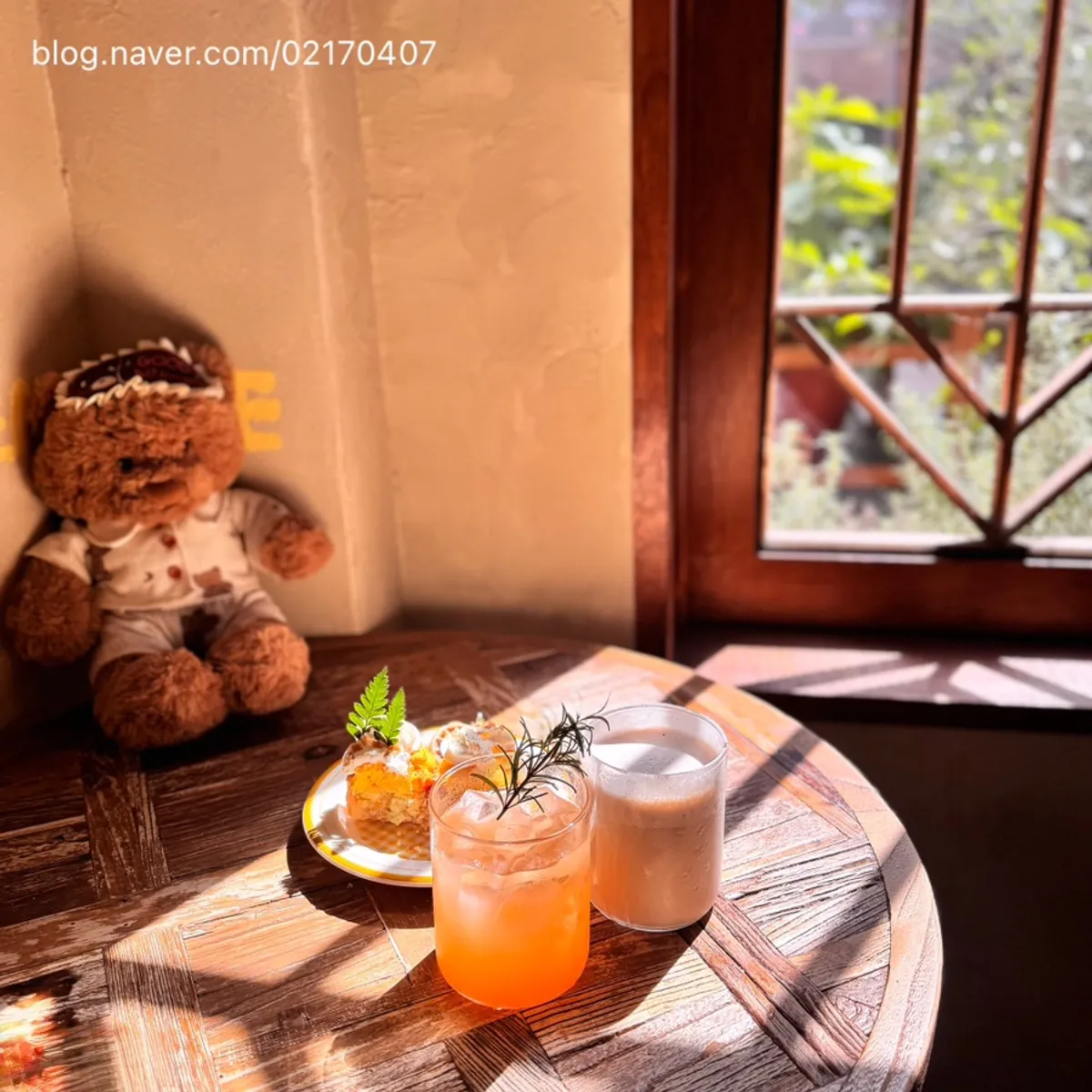 Cream pie and drinks at a sunny window table