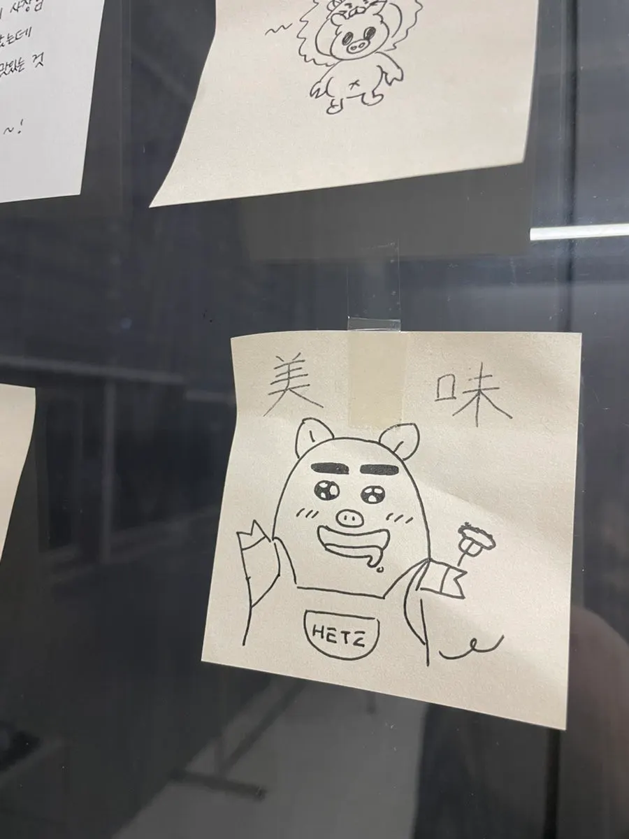 Wall covered with notes left by customers