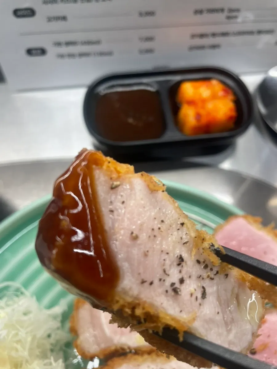 Jeju black pork loin katsu drizzled with truffle oil
