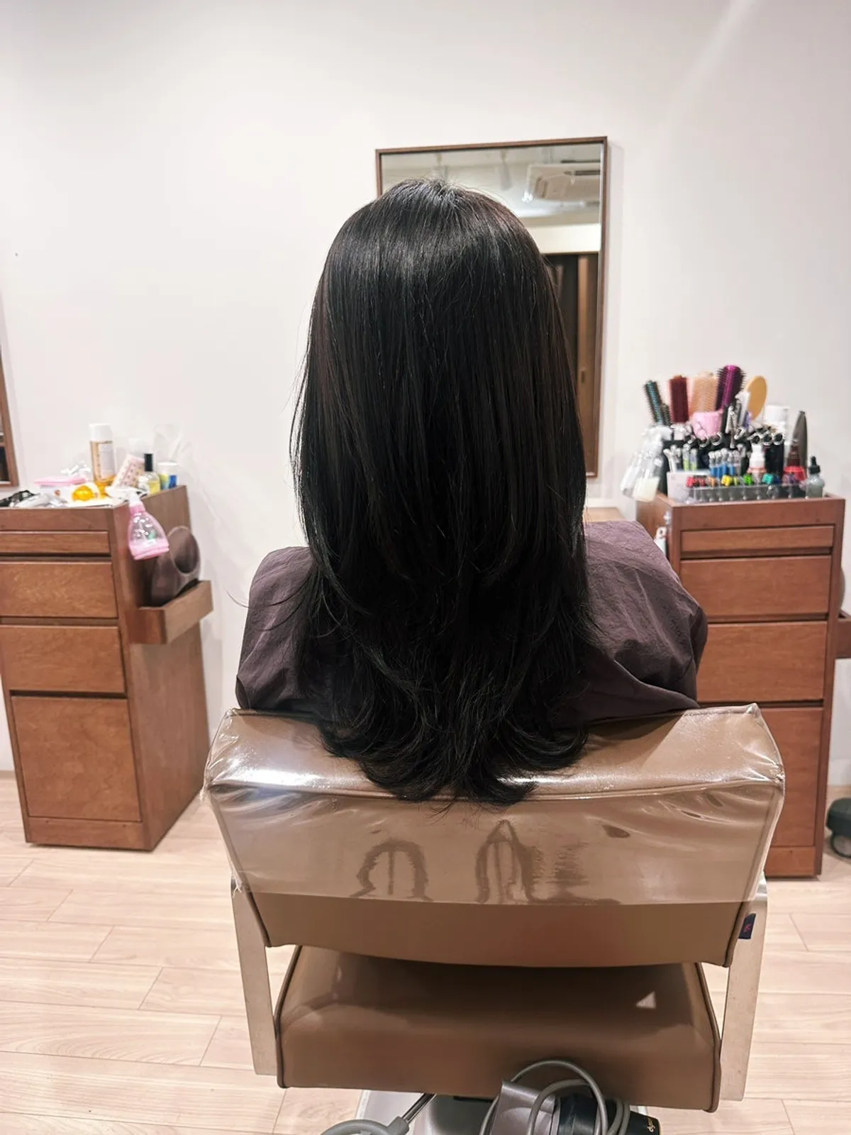 Shiny ash brown hair result after the clinic