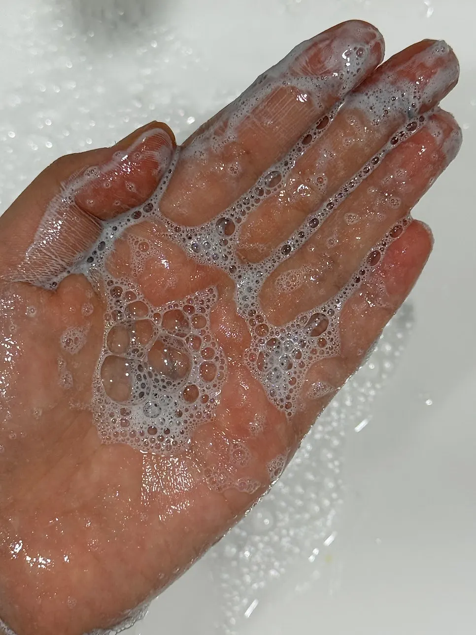 HEEDA cleansing foam texture squeezed onto palm