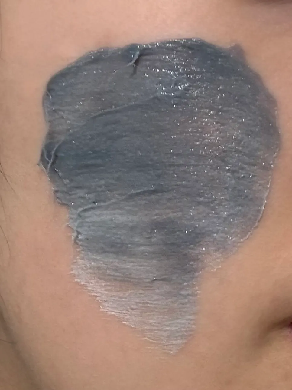 Washing face by rolling foam over skin