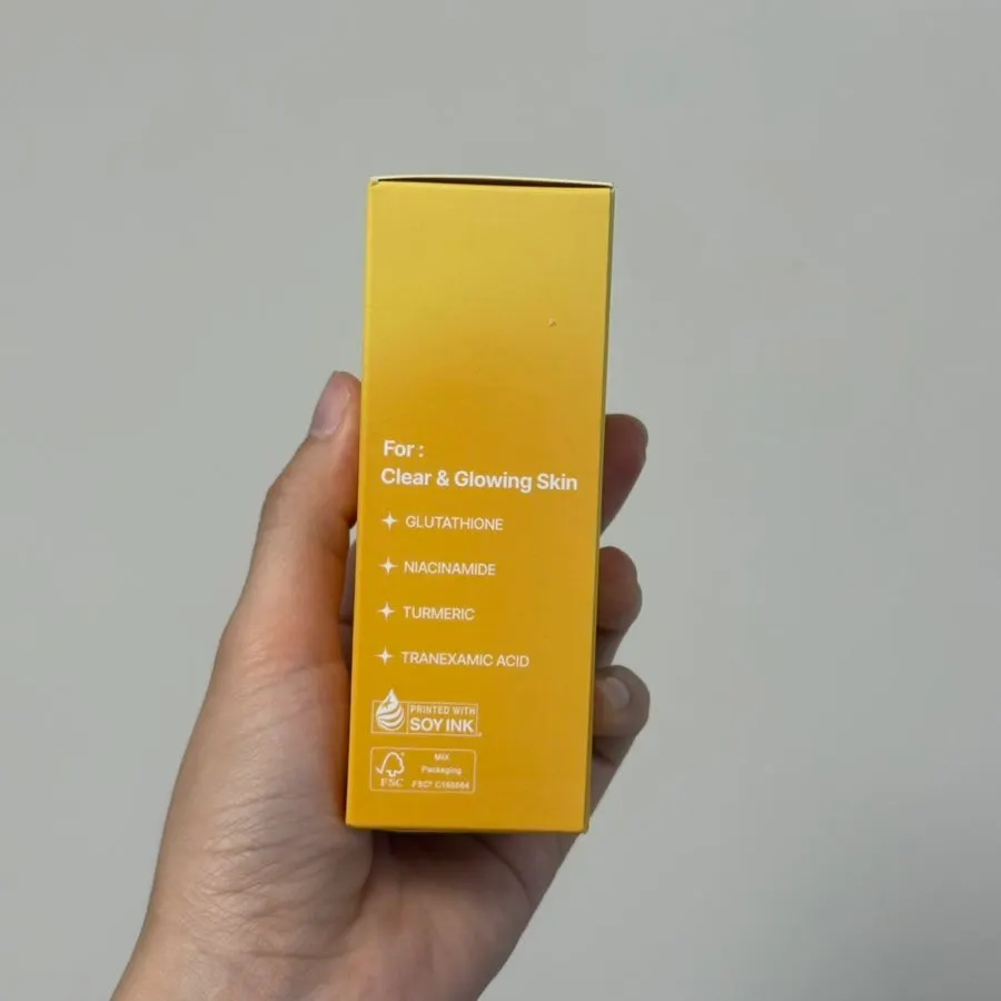 Applying the serum during morning skincare