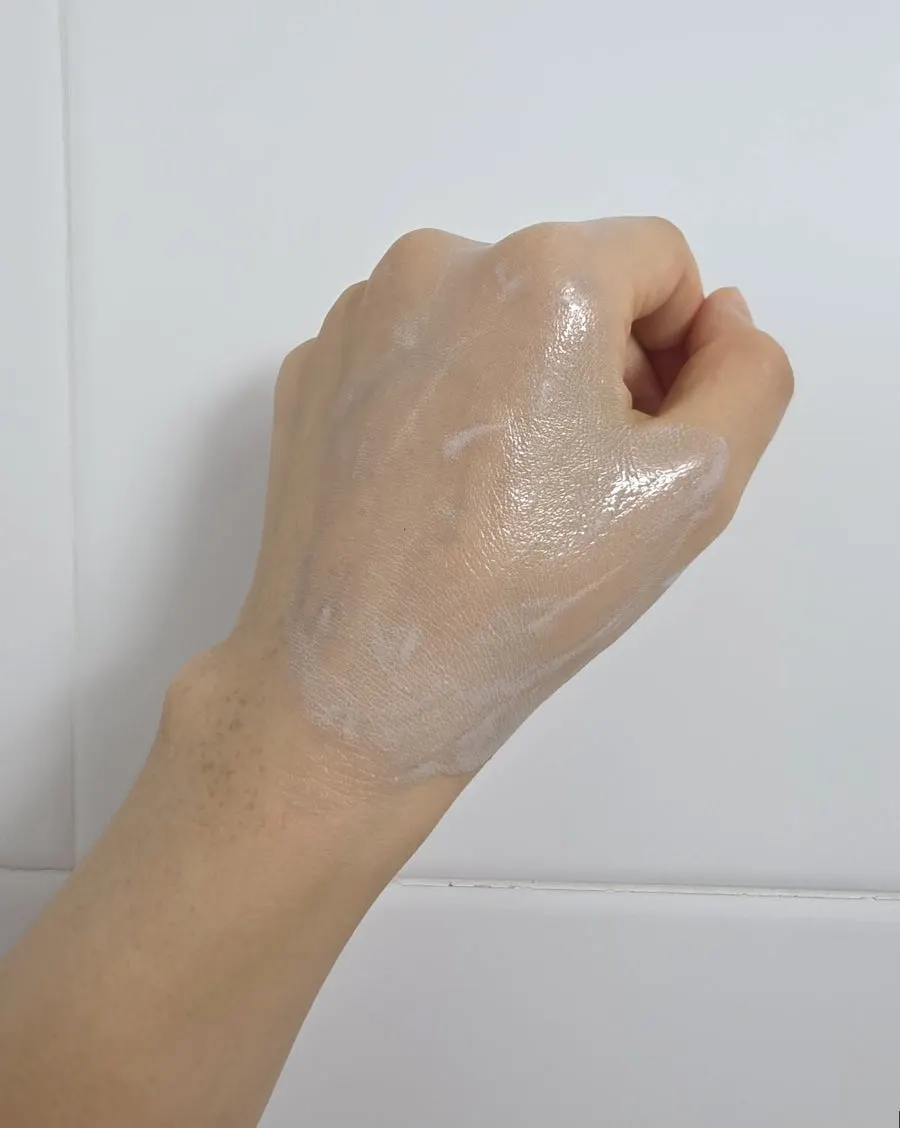 Makeup residue left on the back of the hand after the first rolling pass