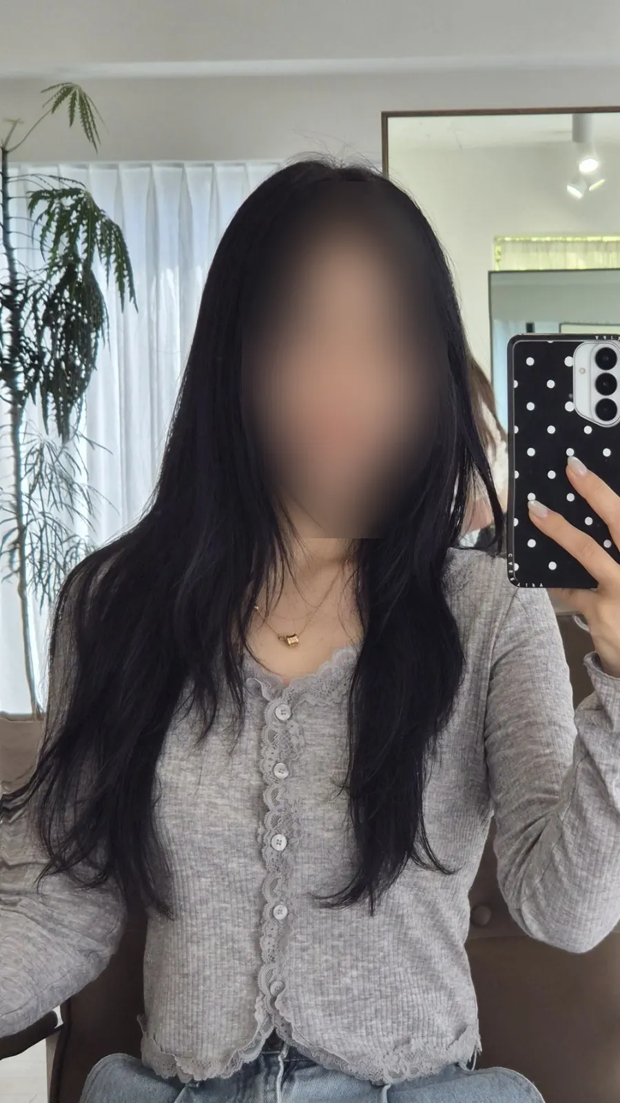 Back view of long hair before the treatment