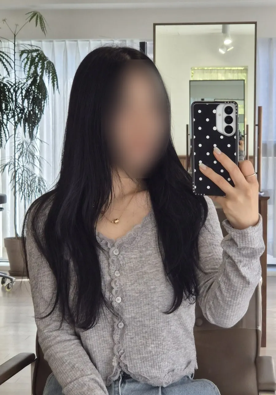 Front view before treatment showing traces of an old perm