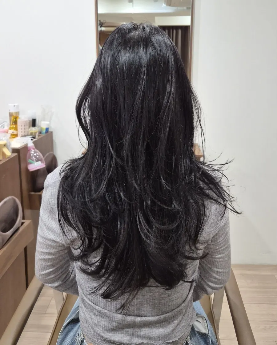 Back view showing the flicked-out direction of the hush perm