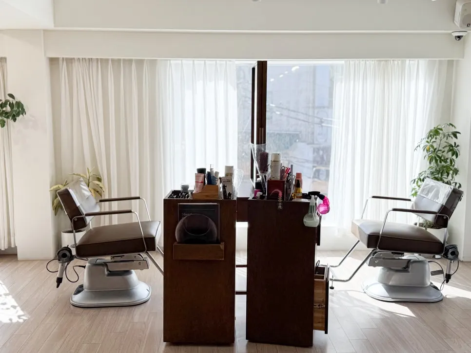 Treatment area with wood-tone interior at Heeol Hair Gangnam
