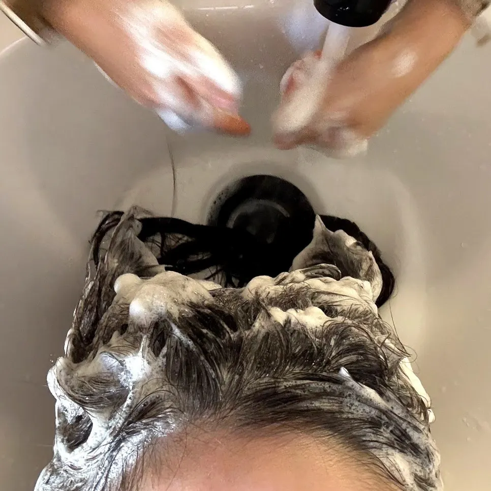 Shampoo process before treatment in the shampoo room