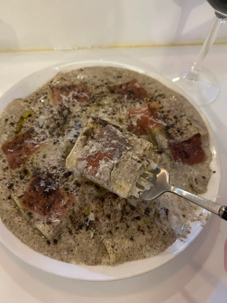 Truffle paccheri tossed in the cream sauce