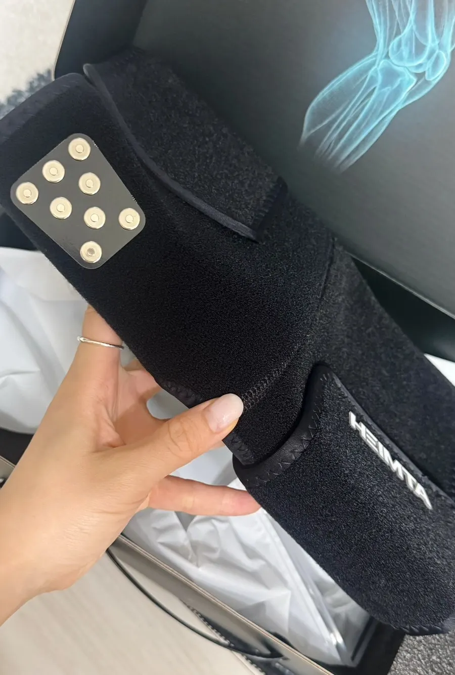 Preparing to attach the controller to the main massager unit