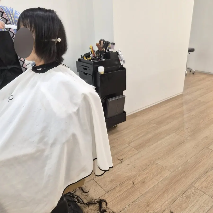 The designer personally handling the cut