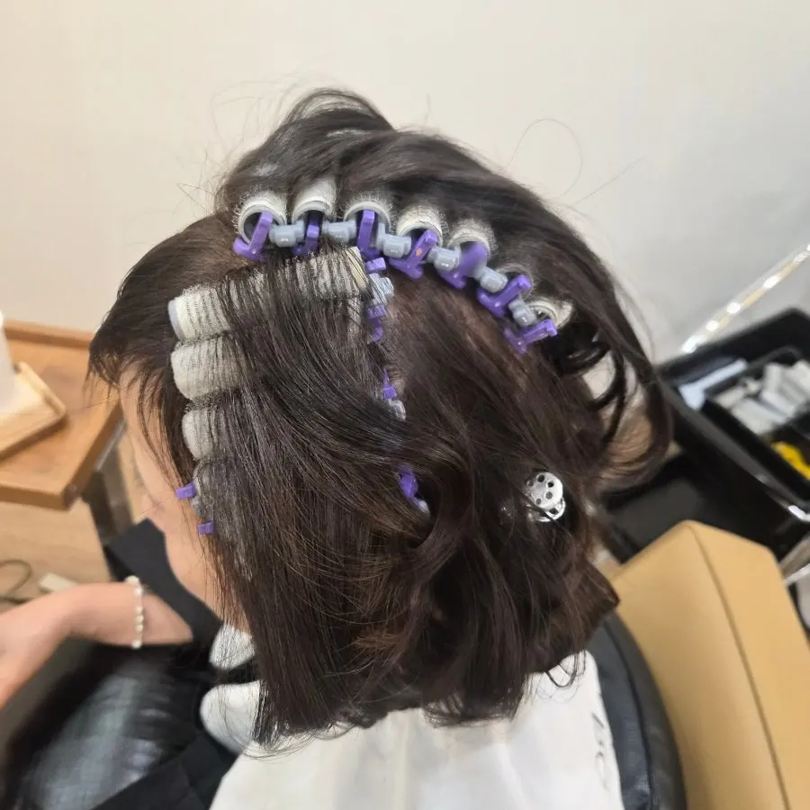 Root perm and magic straightening in progress