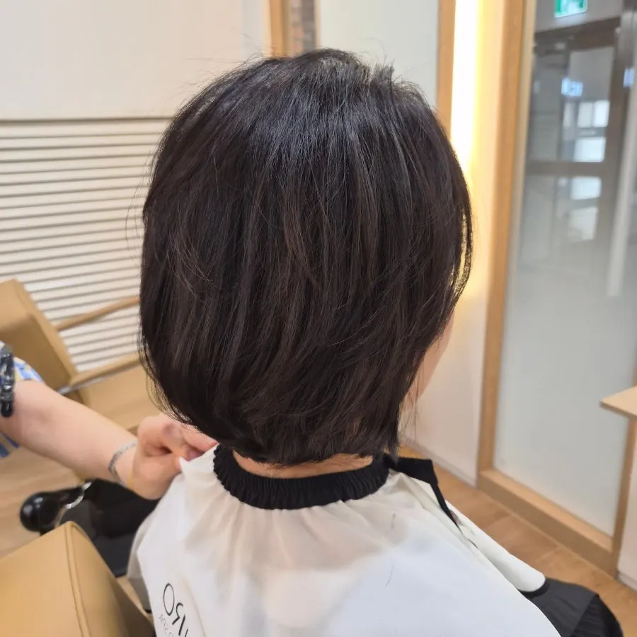 Designer explaining the at-home blow-dry styling method