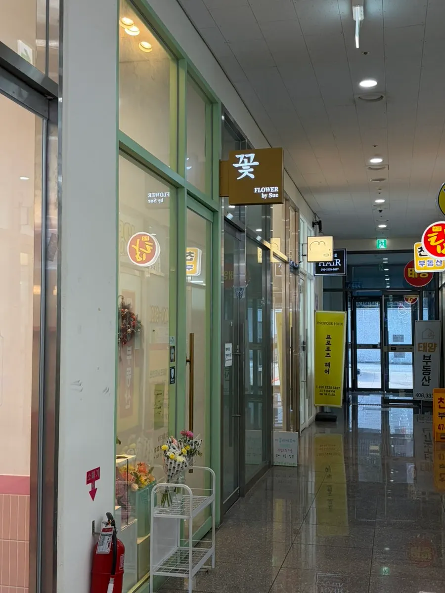 Interior passage of Helio City complex behind Tous les Jours