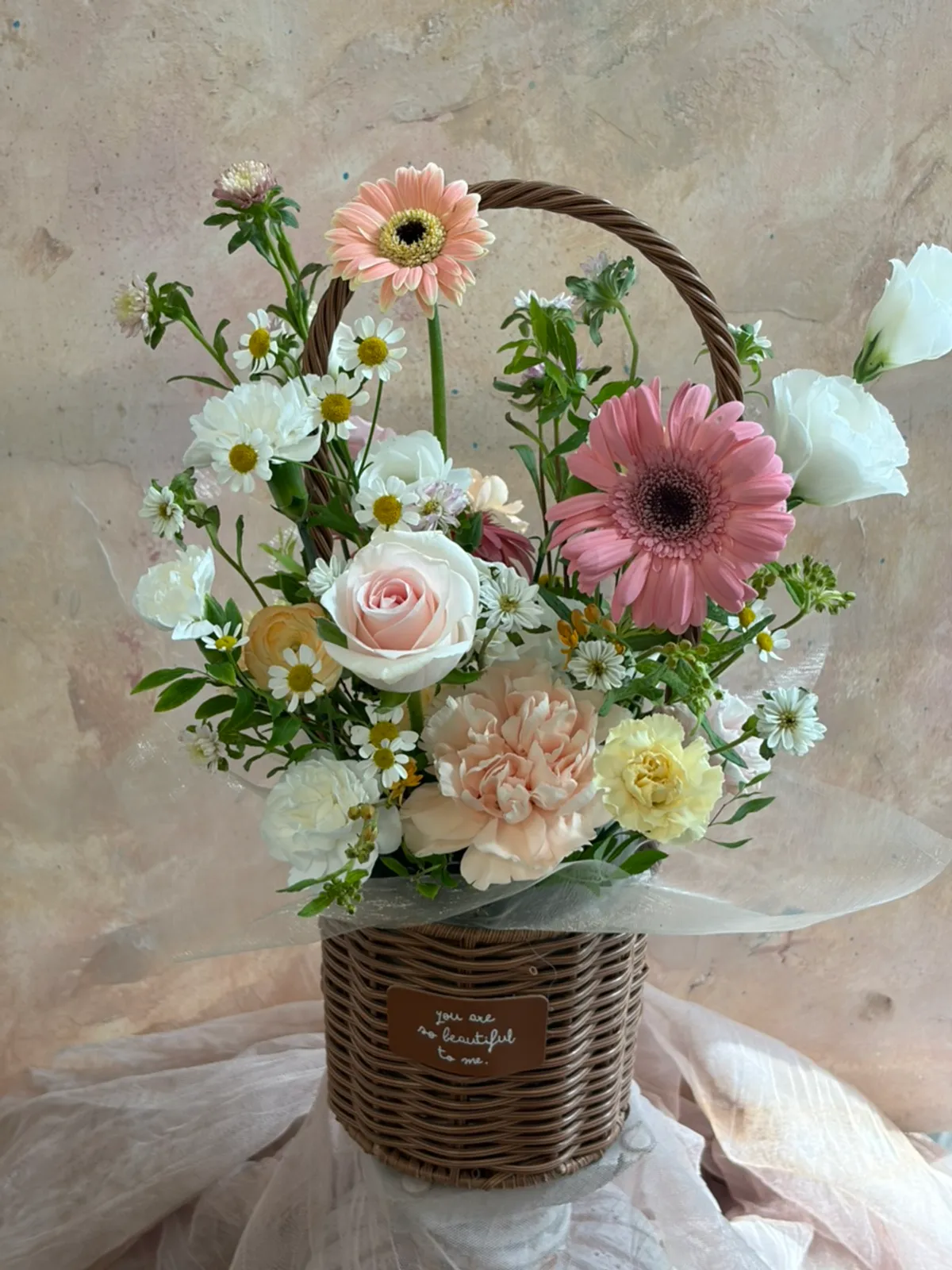The mini flower basket received after reservation