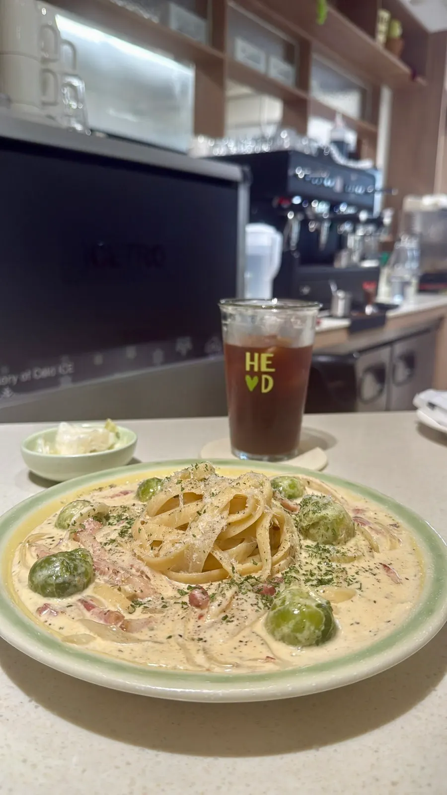 Thick cream pasta topped with napa cabbage