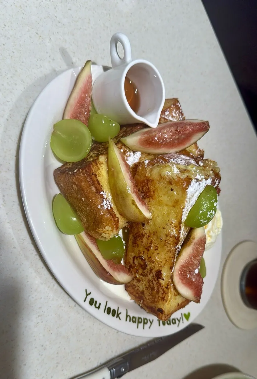 French toast topped with fruit and ice cream