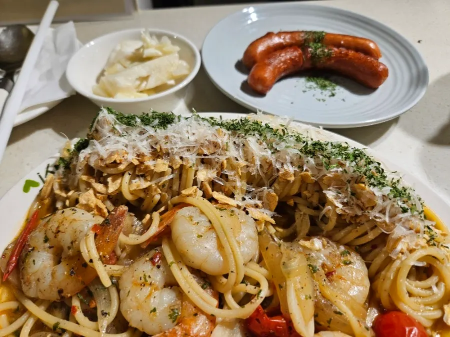 Table with pasta and iced americano set