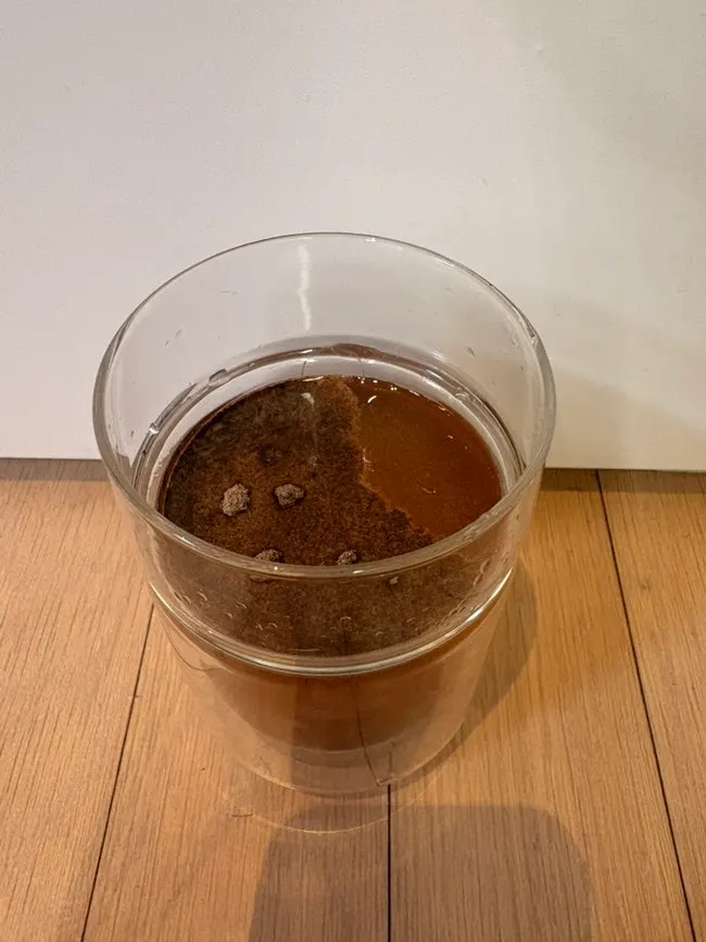 A cup of Dark Americano mixed with water