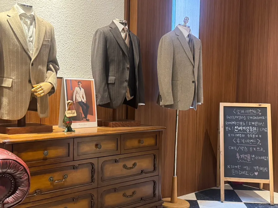 Interior of the shop with mannequins wearing suits