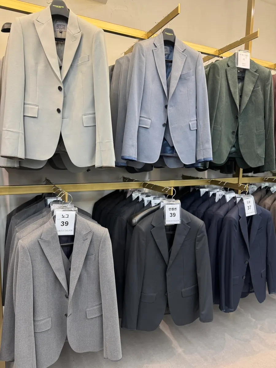Rack mixing double-breasted and single-breasted jackets