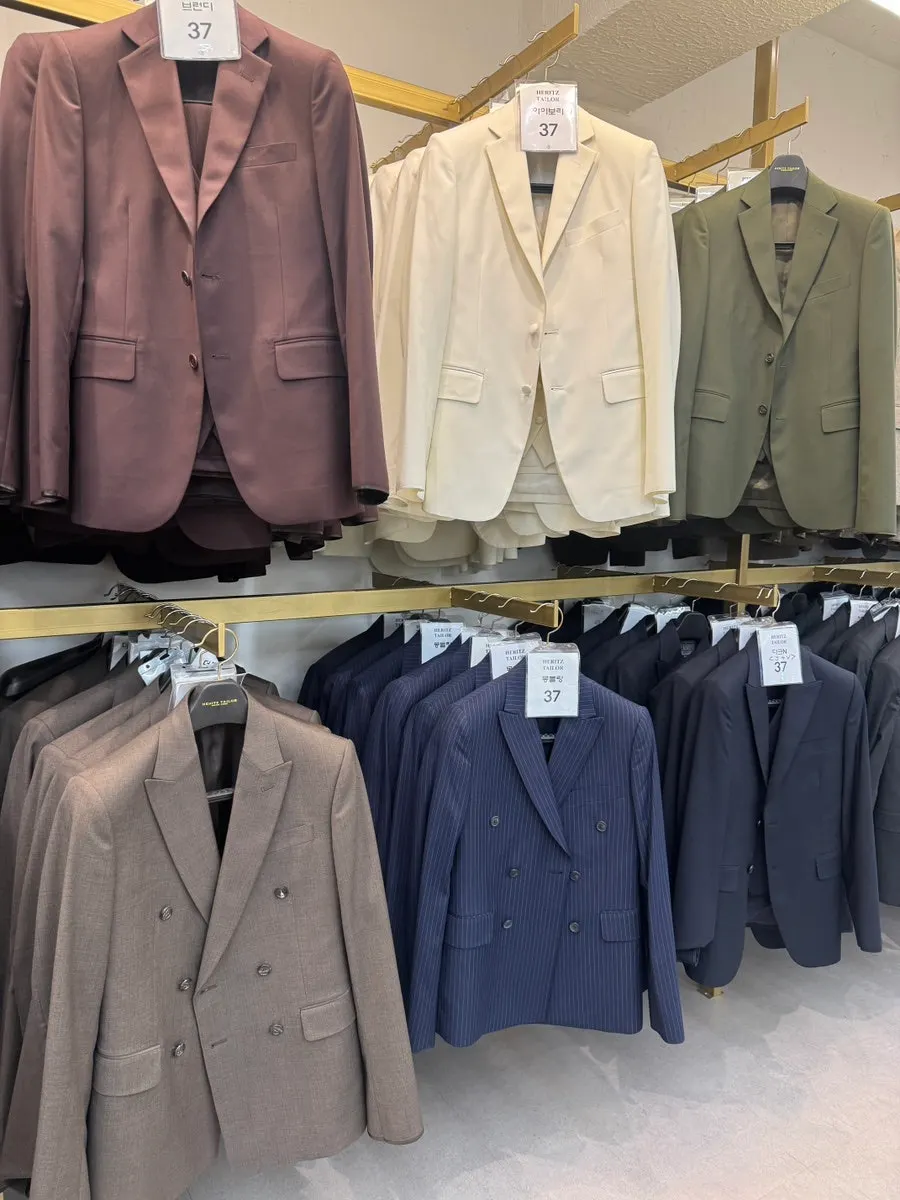 Display of various colored shoot suits