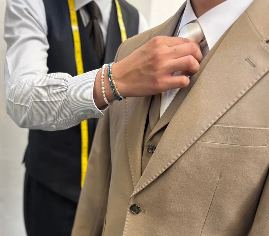 Detail of the classic black shoot suit