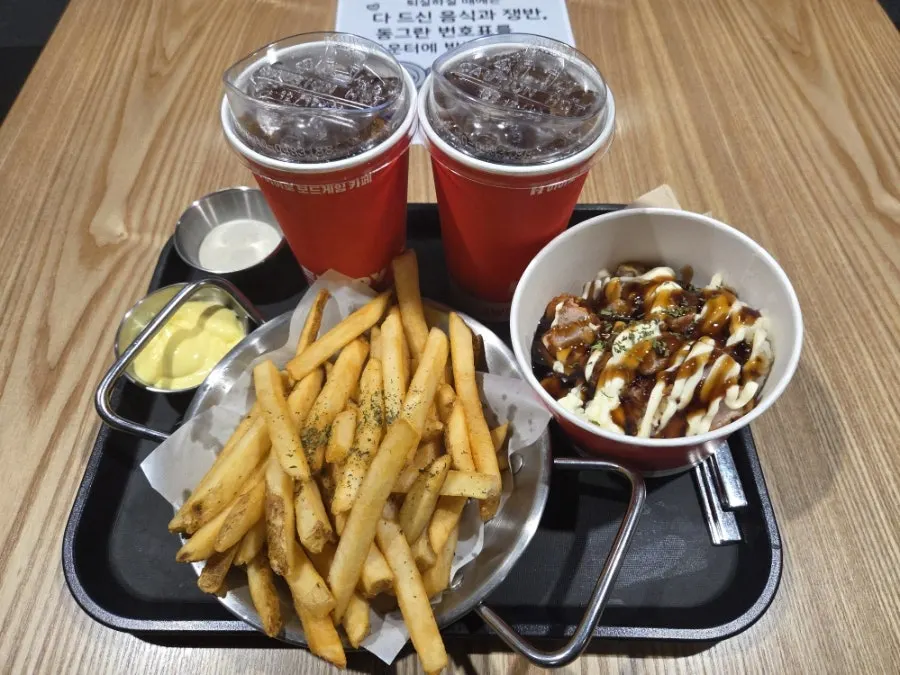 Table spread of chicken mayo rice bowl and honey butter garlic fries
