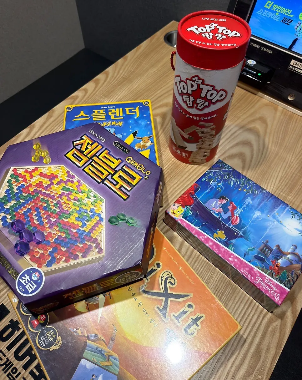 Board games and puzzle boxes brought to the room