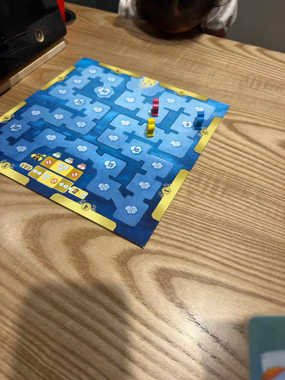 Playing Jenga at the table in the seated room