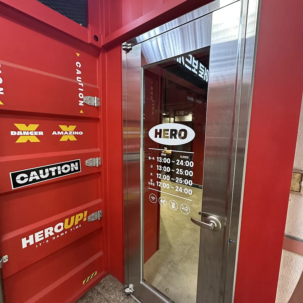 Store entrance with sign for the weekend free Americano event