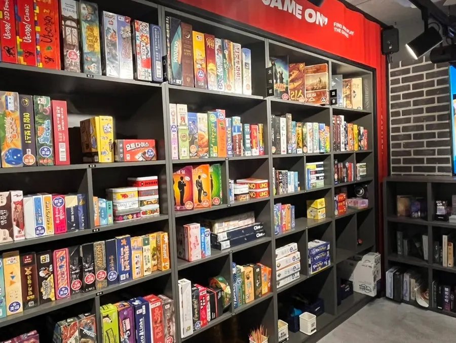 Board game boxes wrapped in plastic