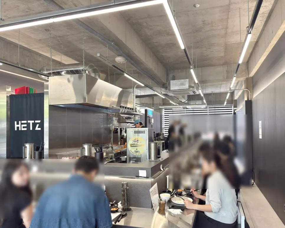 Interior of Hets Jeonpo Branch decorated in silver and black
