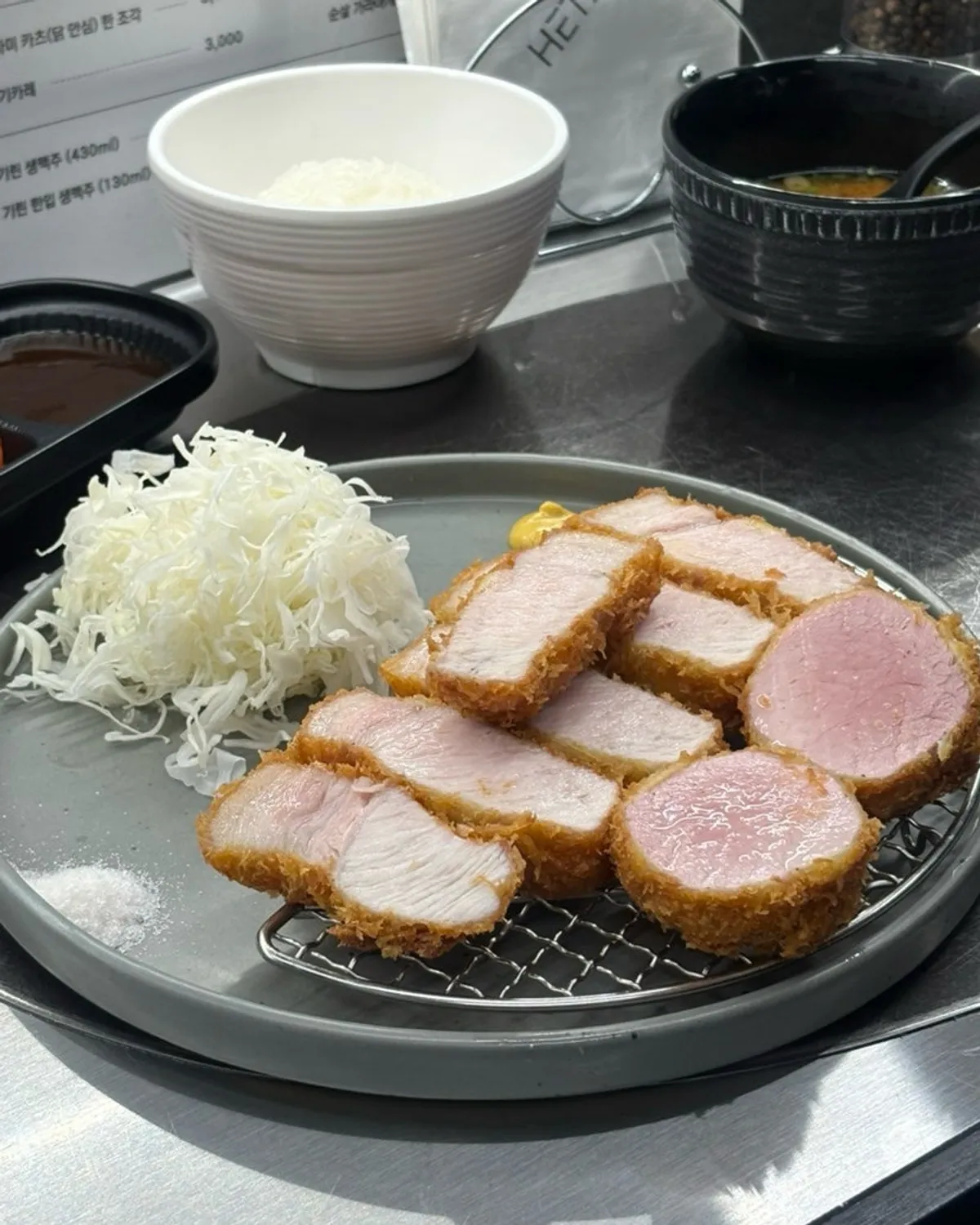 Standard miso soup, rice, kkakdugi, and sauce