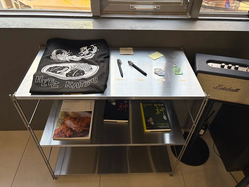 Waiting area with hangers and aprons