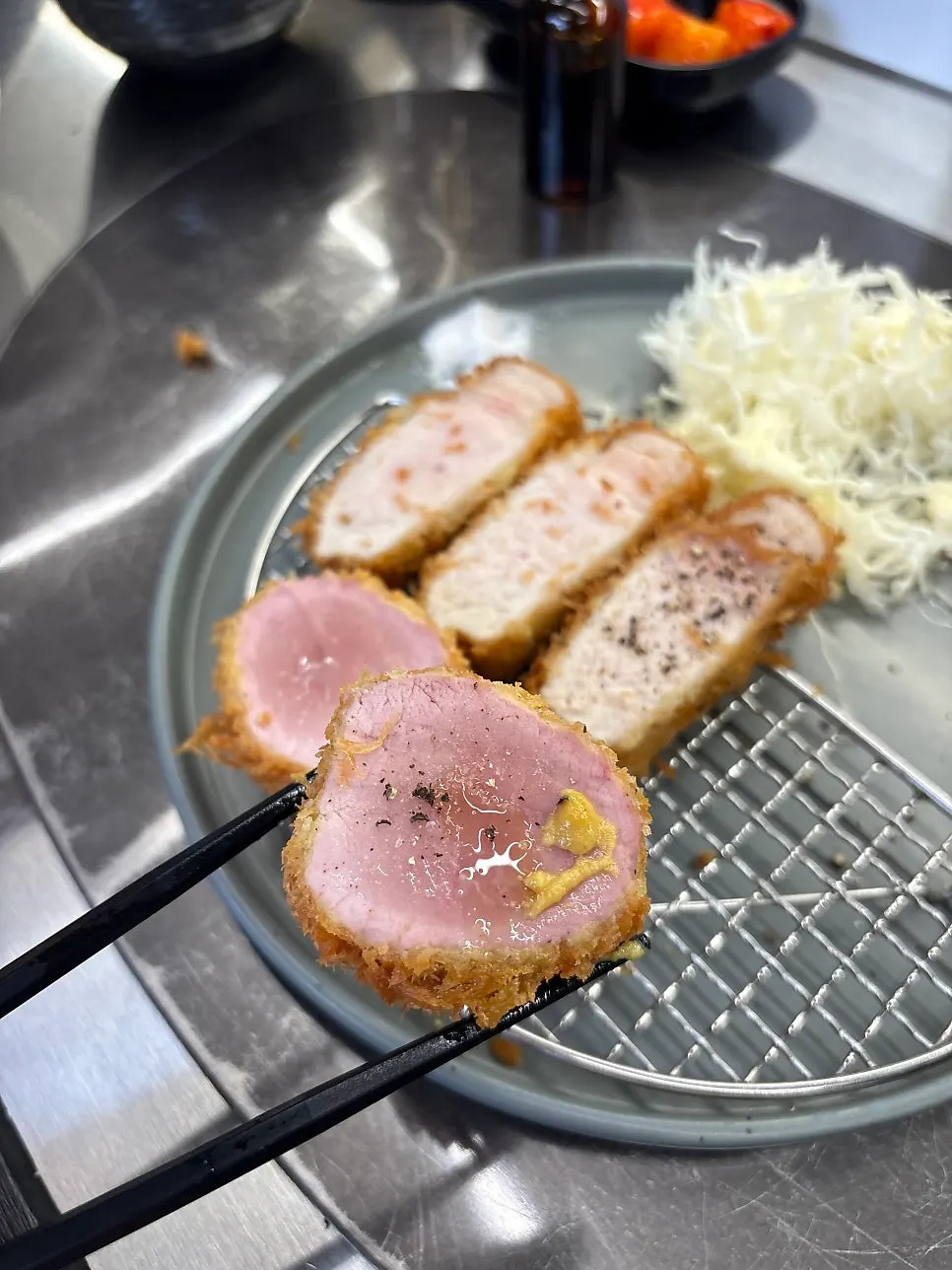 Katsu paired with truffle oil, pepper, salt, and mustard sauce