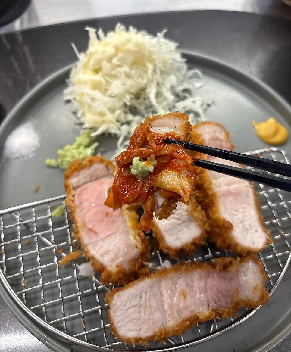 Katsu topped with silbi kimchi and wasabi