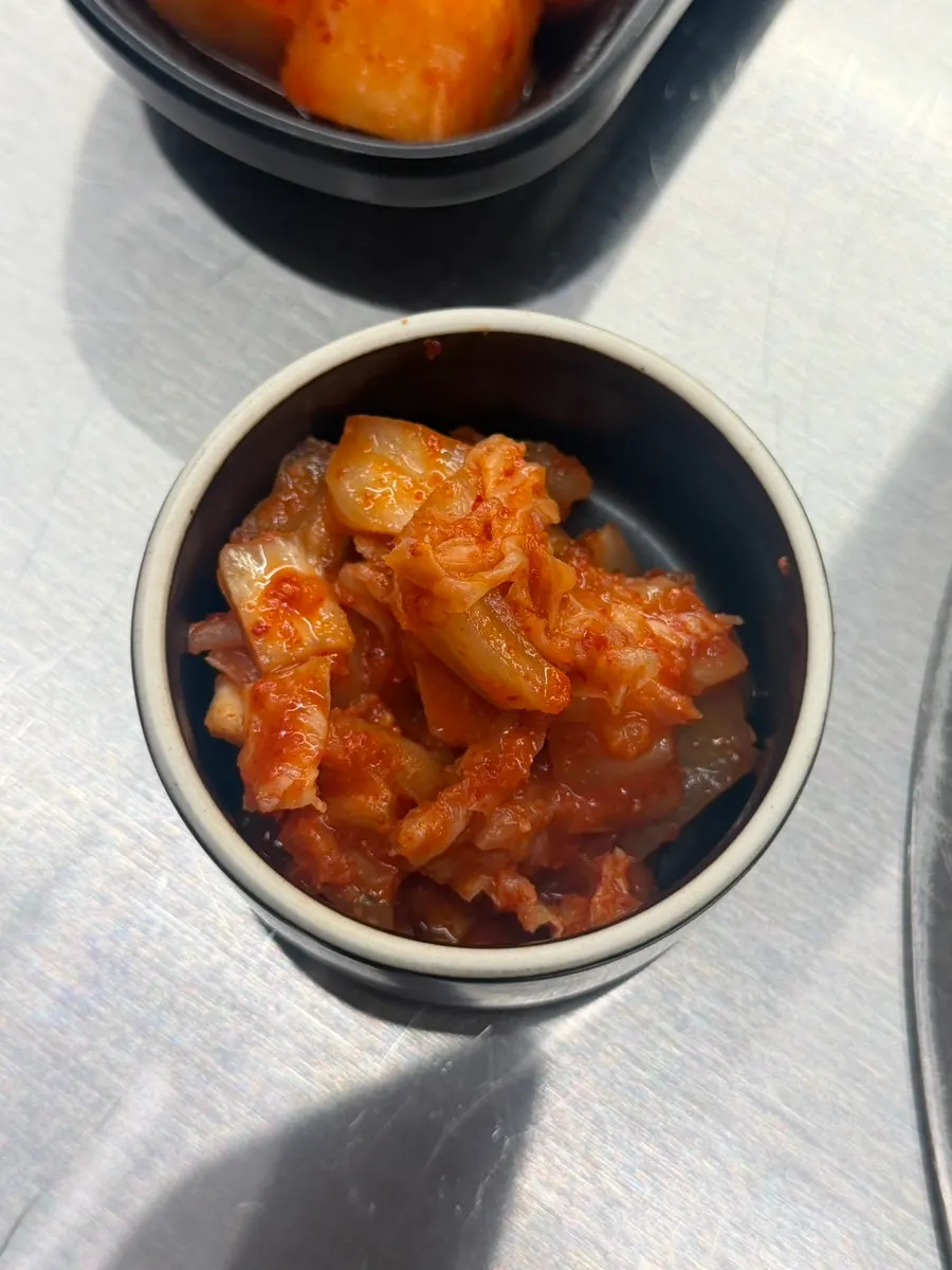 Tonkatsu sauce with kkakdugi and silbi kimchi side dishes