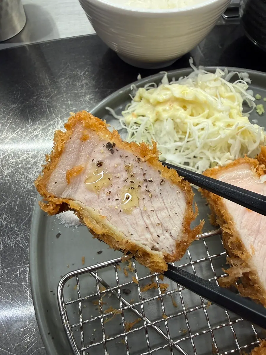 Katsu paired with truffle oil and pepper