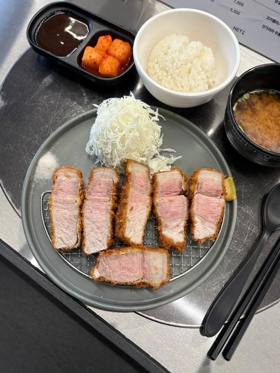 Cross-section of the juicy Jeju black pork sang loin katsu