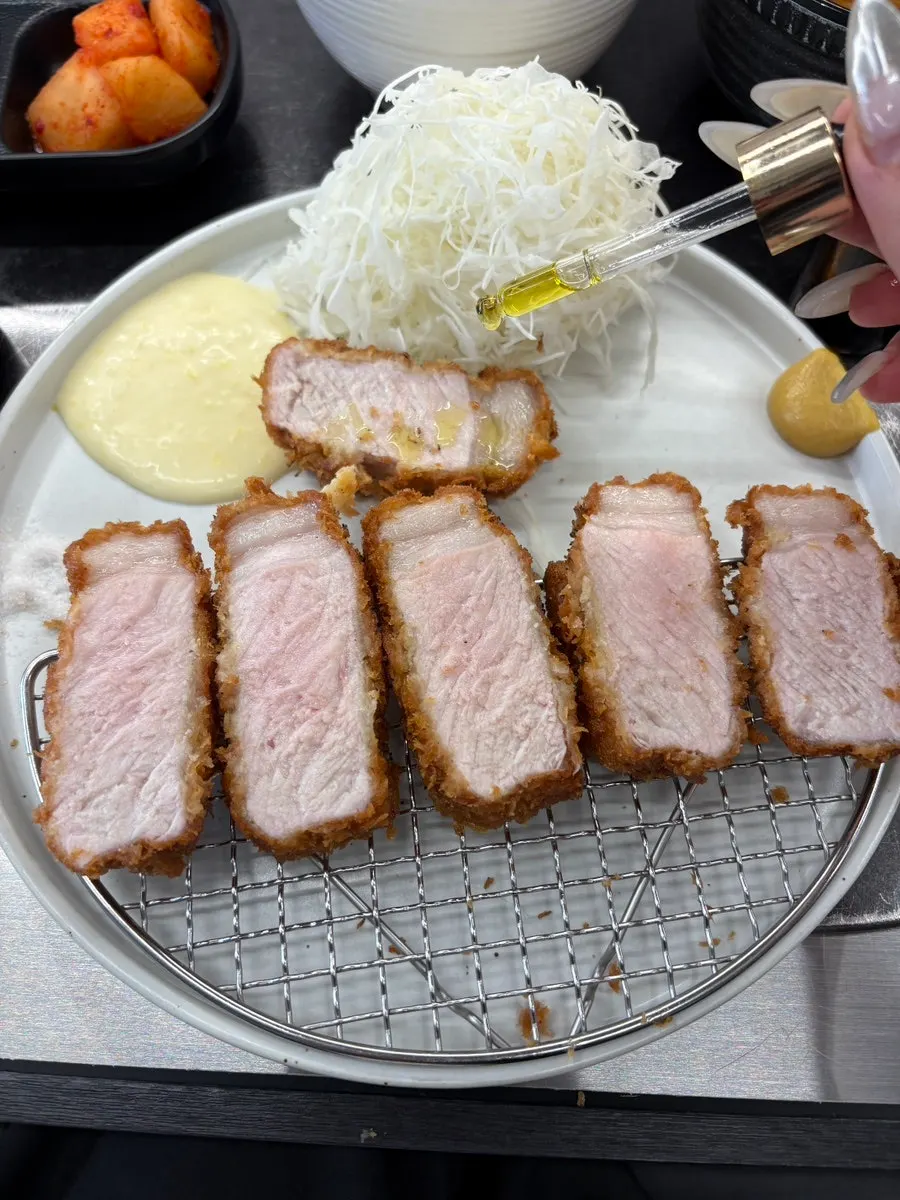 Jeju black pork sang loin katsu sprinkled with pepper
